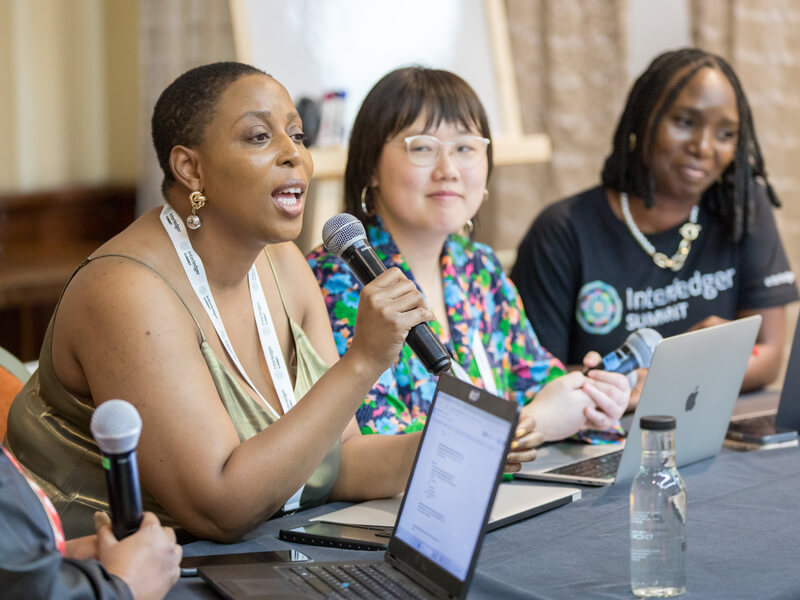 Victoria Coker speaking at a roundtable discussion during 2023 Summit